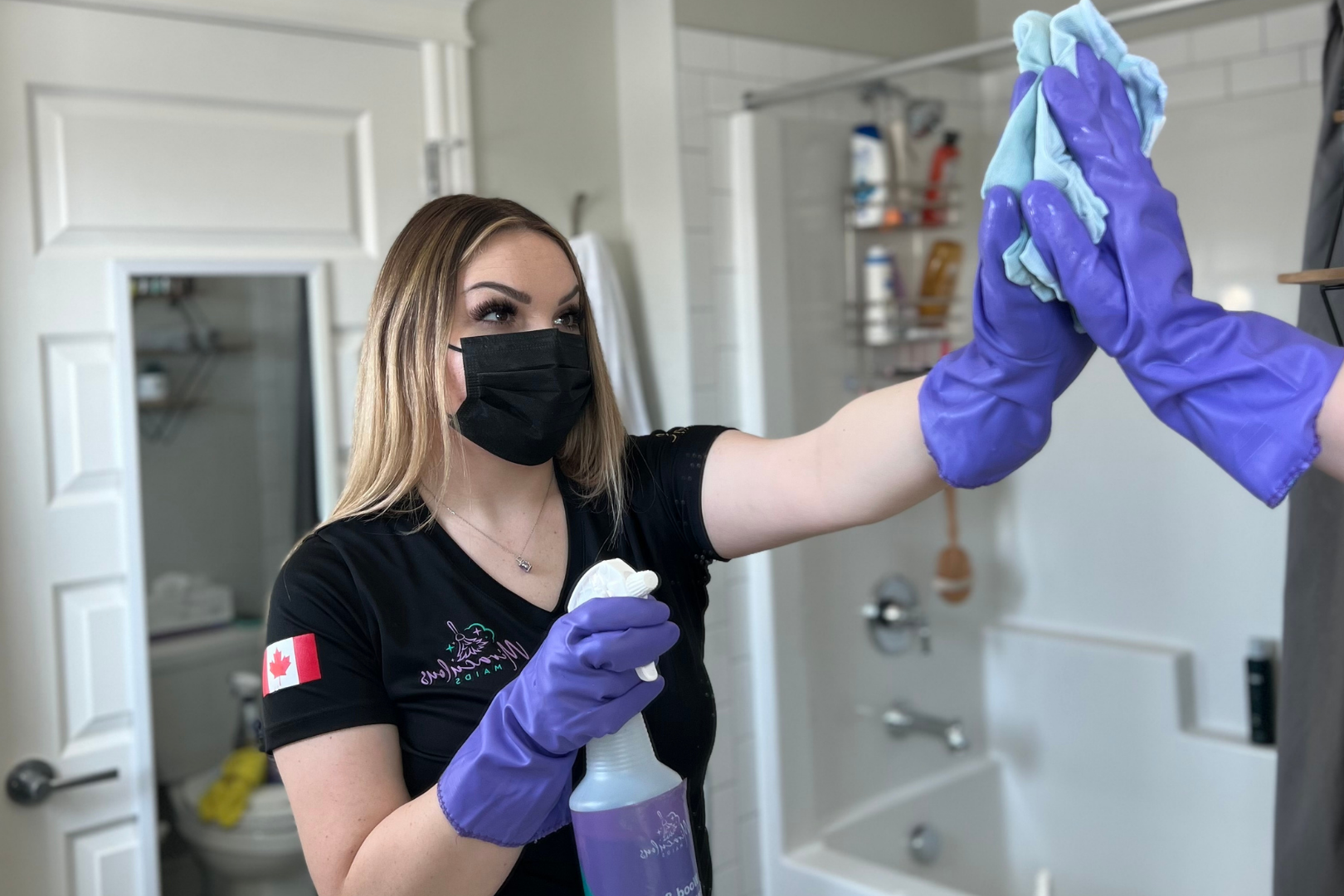 miraculous maids worker washing a window